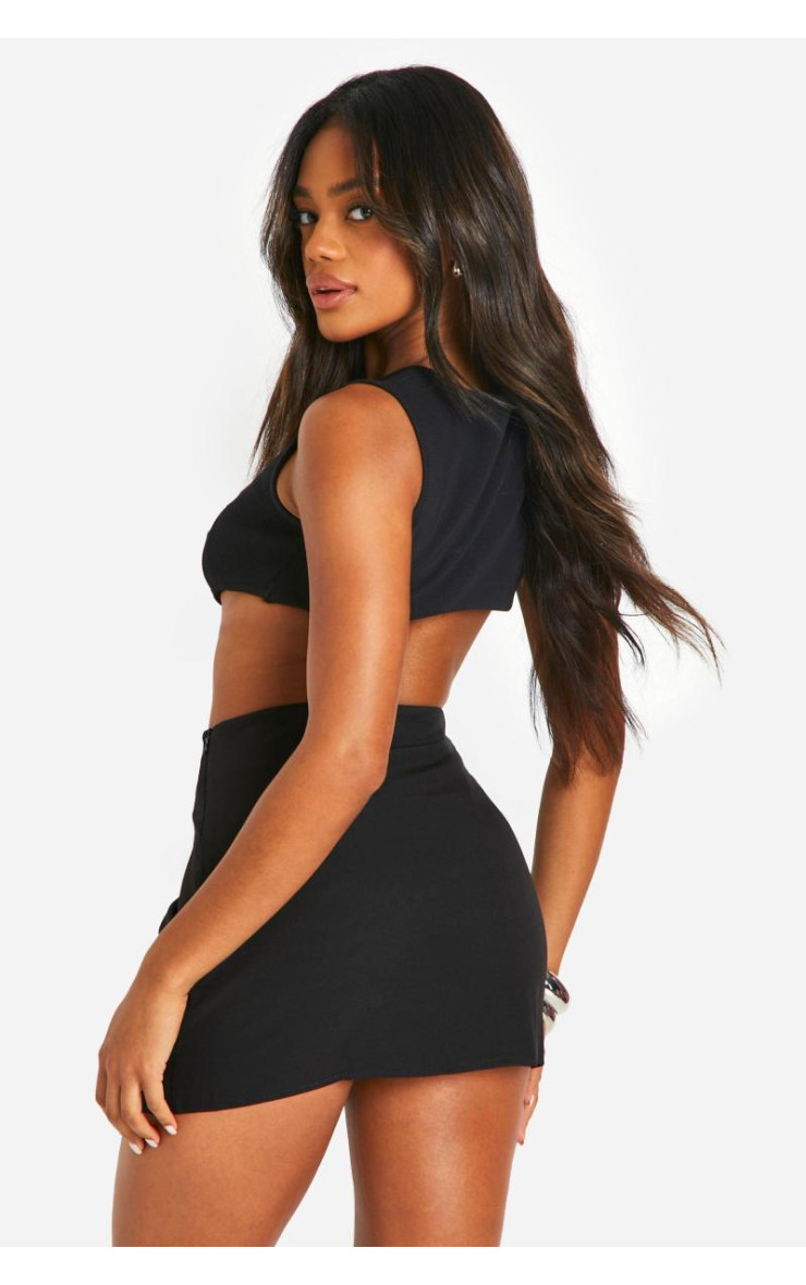 Міні-спідниця з подвійним розрізом спереду