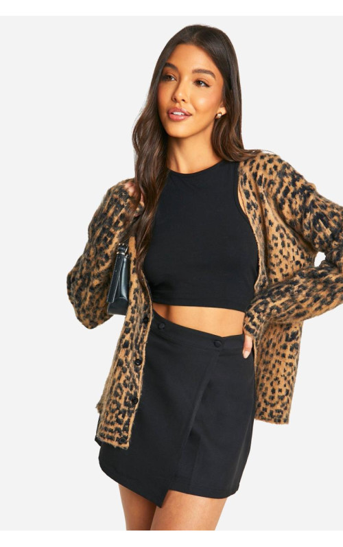 Міні-спідниця з накидкою поверх