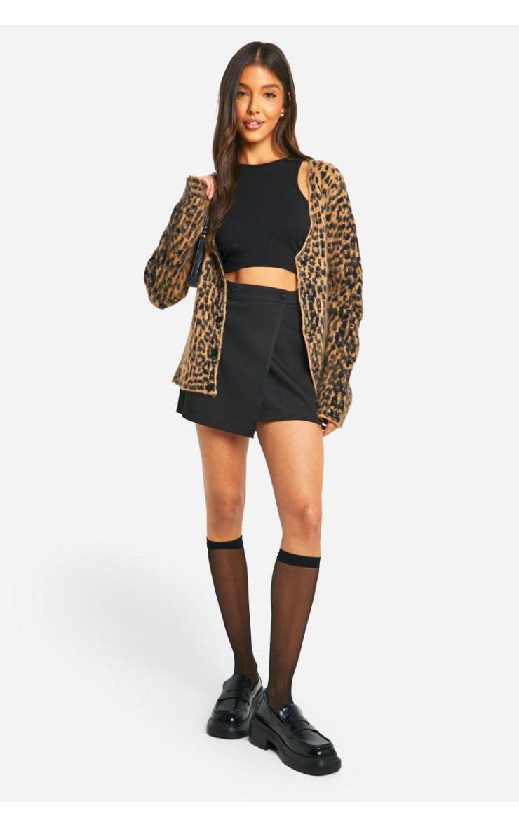 Міні-спідниця з накидкою поверх
