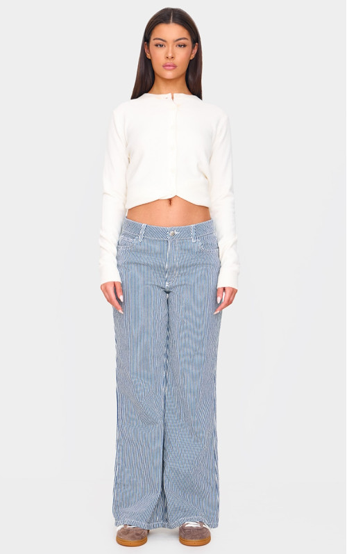 Розслаблені мішкуваті джинси в блакитну смужку