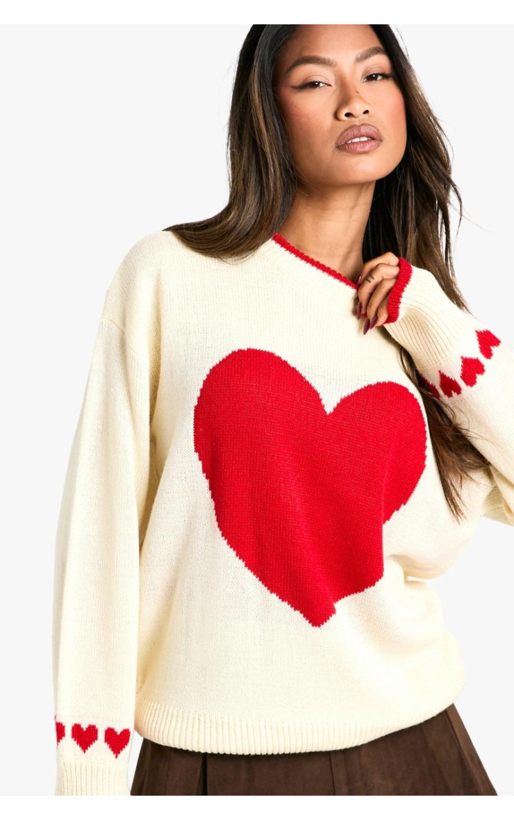 Величезний різдвяний джемпер у формі серця