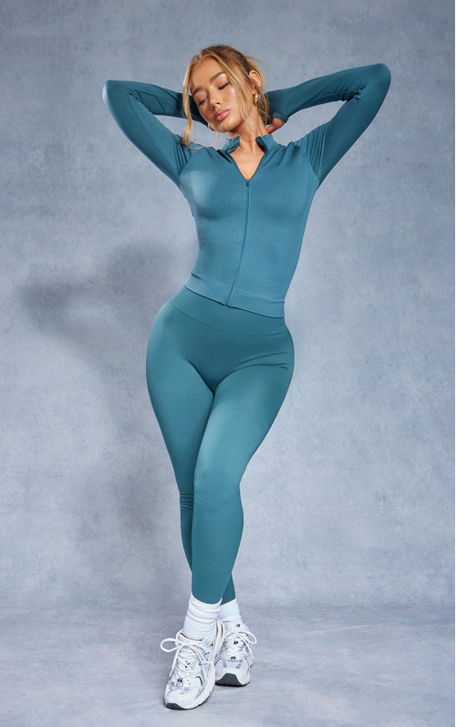 Темно-зелені базові безшовні легінси з високою талією