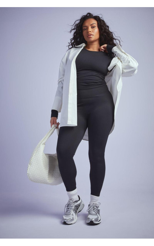 Плюс безшовні легінси в рубчик