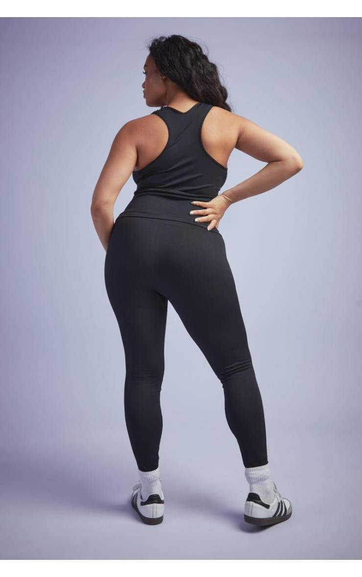 Плюс безшовні легінси в рубчик