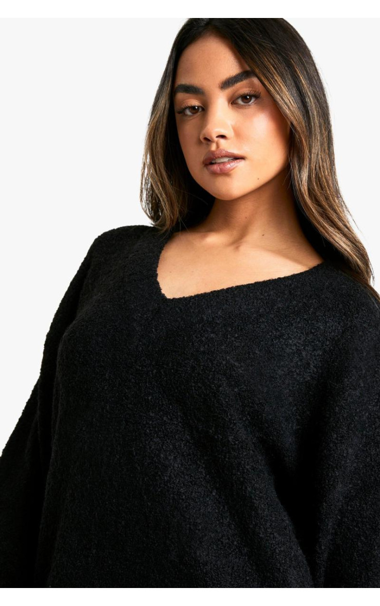 Міні-джемпер Borg з глибоким V-подібним вирізом