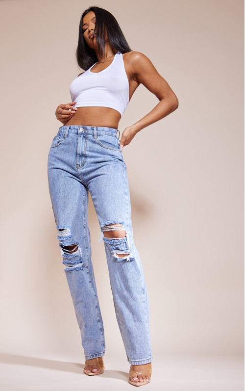 Середньо-блакитні вінтажні рвані прямі джинси